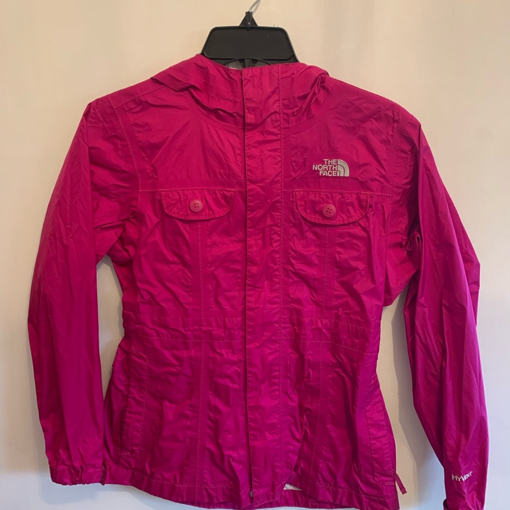 North Face pink rain/wind jacket . Size 10/12